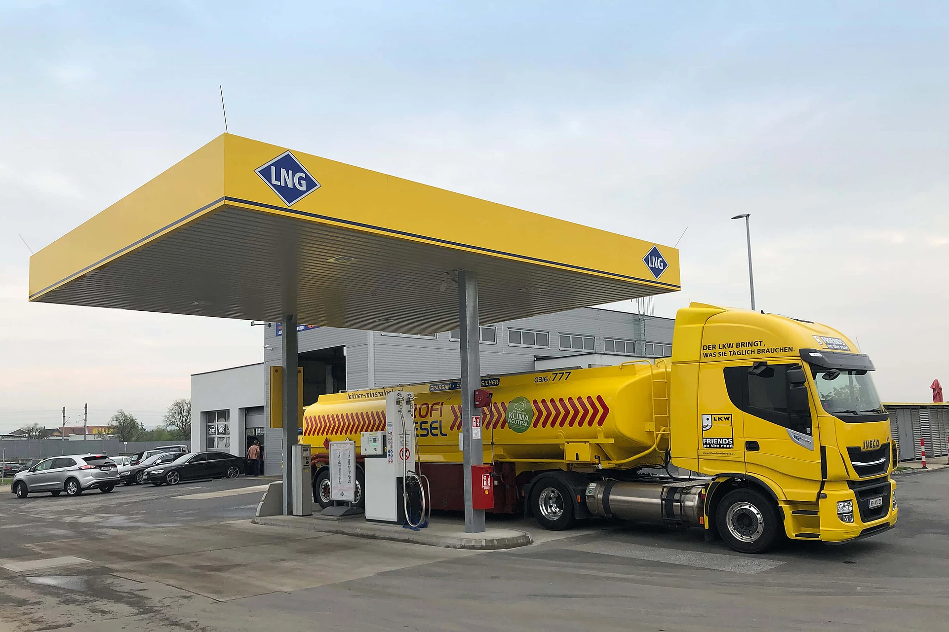 Yellow truck behind LNG gas station in Graz