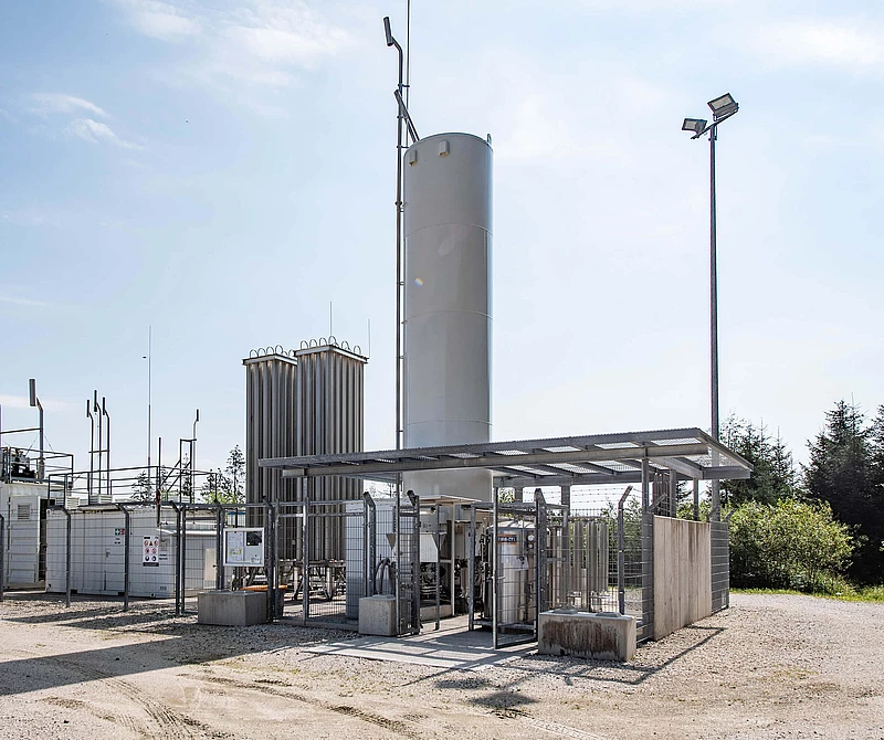 Bio-LNG plant against a blue sky
