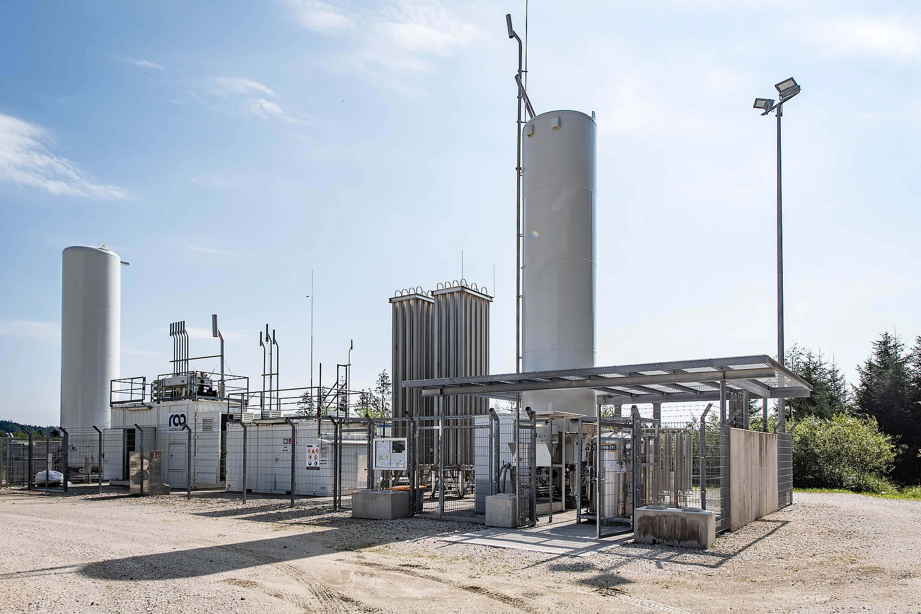 Bio-LNG plant against a blue sky